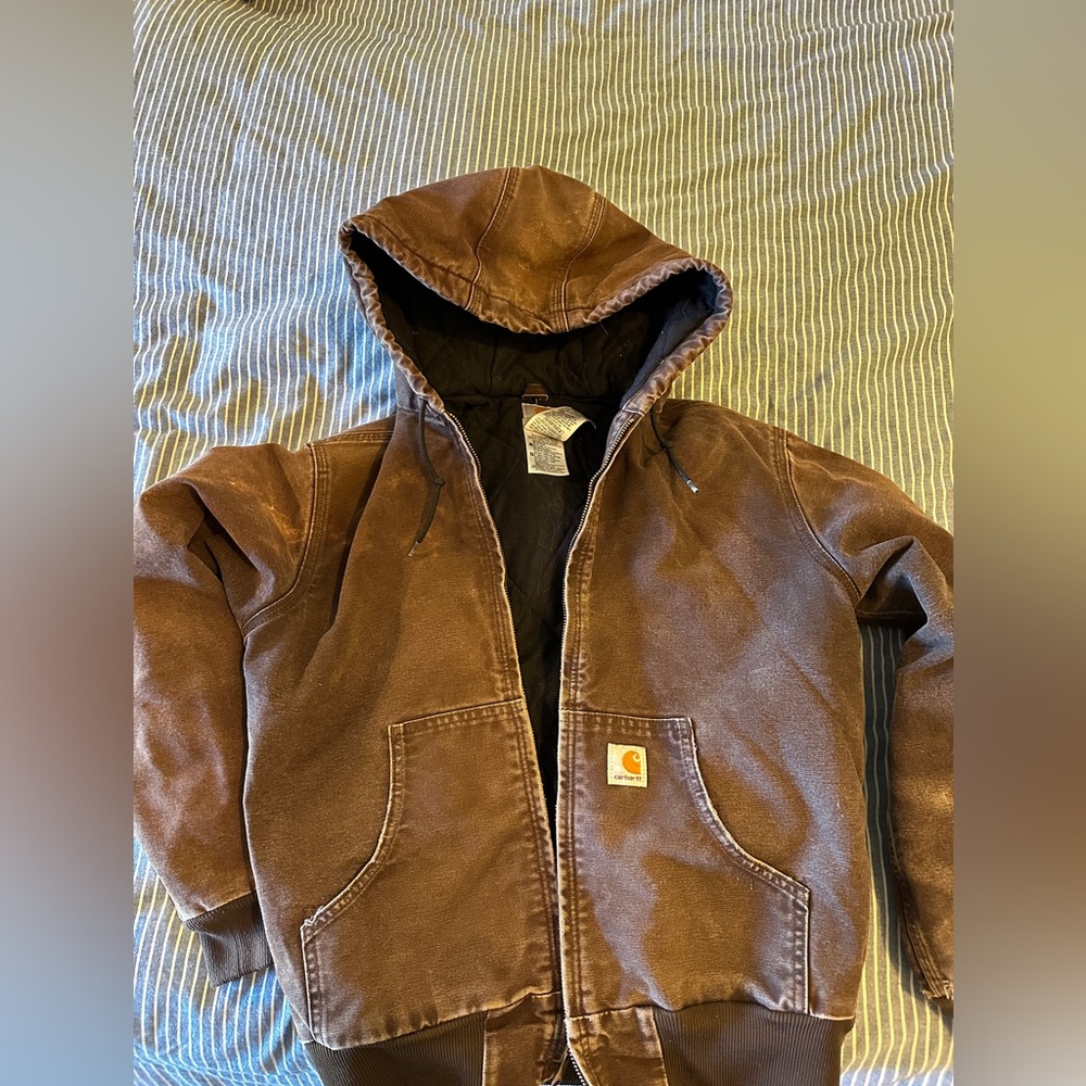 Carhartt coat/jacket. Montana Ranch so it’s been used. Woman’s small.